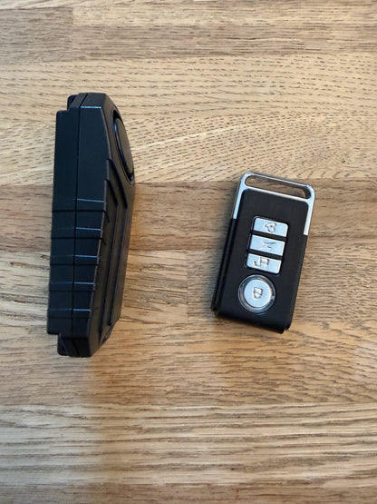 Alarm med fjernbetjening