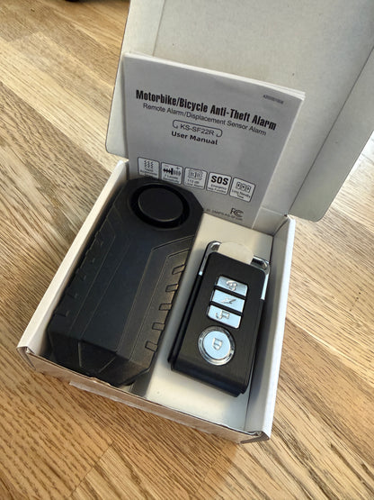 Alarm med fjernbetjening